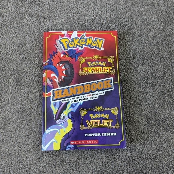 Scholastic Other - Scarlet & Violet Handbook (Pokémon) (Pokémon) Paperback –2023 by Scholastic